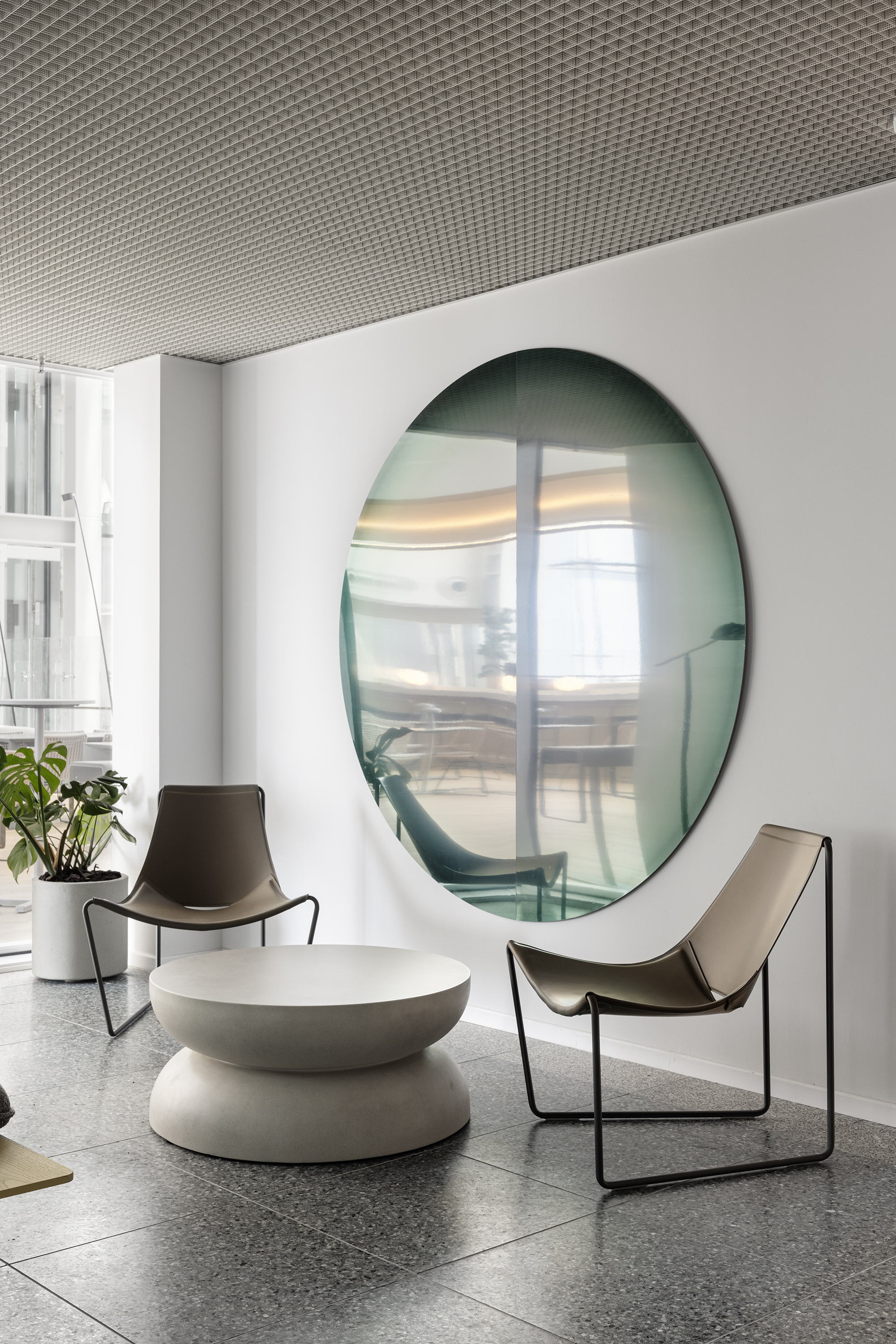 Infinity Mirrors — large gradient mirror in the lounge.